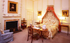 Bedroom with portrait of Queen Mary